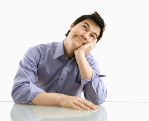 Businessman thinking and hoping.