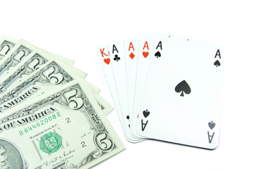 Dollar banknotes with face value 5 and holdem poker cards