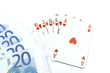 Euro banknotes with face value 20 and holdem poker cards