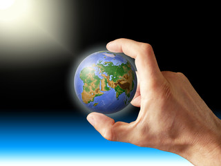 planet Earth in human people hand