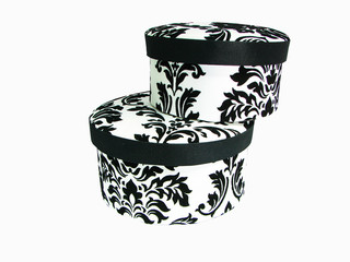 The black and white present box with ornament.