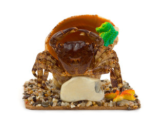Souvenir crab and conch, copy-space on stone