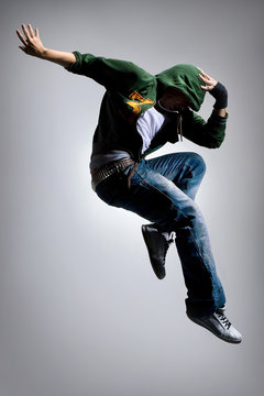 cool looking dancer makes a difficult jump