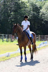 teen on horseback at a show