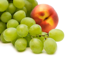 fresh grape and peach on white background