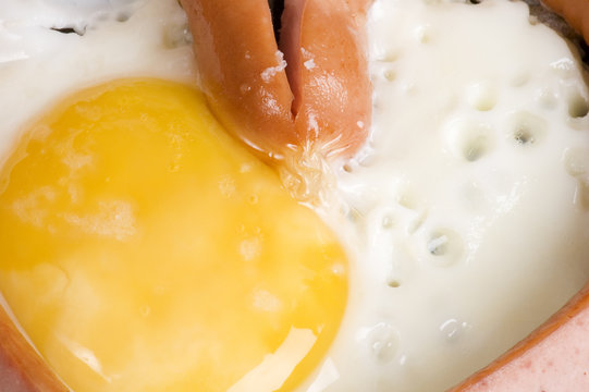 object on white - food fried eggs with sausage