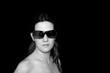 girl fashion glasses over black background