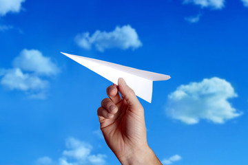 throwing a paper plane..