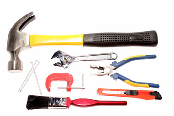 Assortment of tools over white
