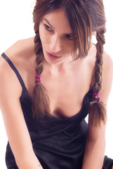 Young adult girl posing at fashion shot with queue hair
