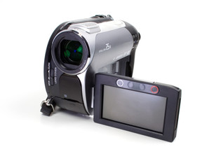 Digital Camera That Takes DV Format Disks On A White Background