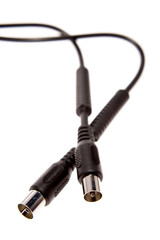 Plugs and cable on white background