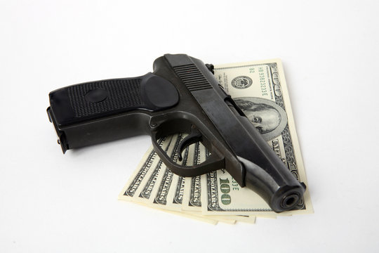 Pistol and money