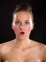 Portrait of surprised and beautiful girl