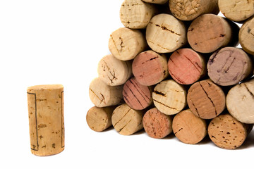 Wine corks over white backdrop