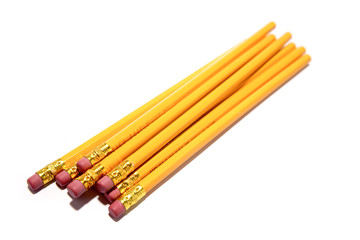 Obraz premium Yellow pencils on white background