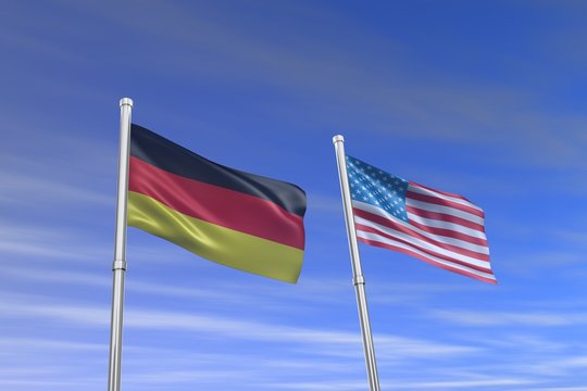 American and German flag in the wind