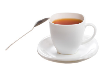 close-up cup of rooibos tea with spoon, isolated on white