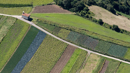 Aereal view of a church amidst fields