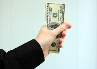 dollars in the hand