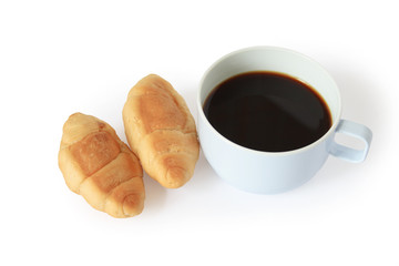 Two fresh croissants and cup of black coffee
