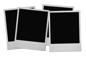 four photo frames on white, minimal shadow behind