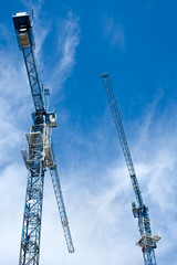 Building tower crane on the sky background