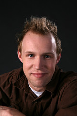 Fototapeta premium confident young man with hair up