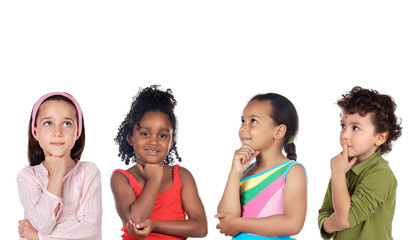 multiethnic group of children thinking a over white background