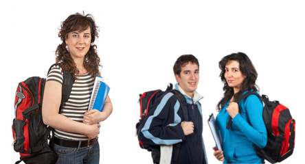 Obraz premium students with backpacks over a white background. Focus at front