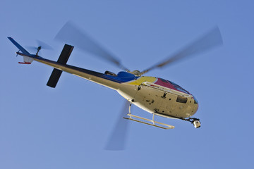 A helicopter with a camera. A motion blur on rotor blades © Rafa Irusta