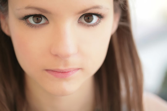 closeup portrait of the young girl with magnetic glance