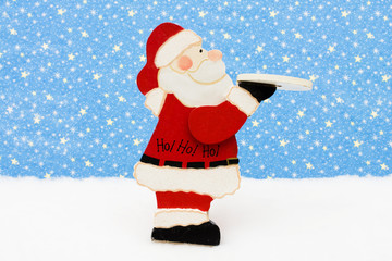 Santa Claus decoration on snow with star background