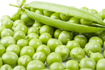 Fresh pods of peas on a white background