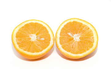 Two piece of orange fruit on backgraund