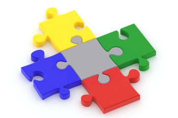 Colorful puzzle pieces isolated ower a white background.