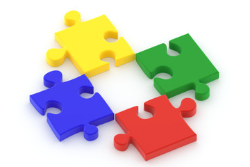 Colorful puzzle pieces isolated ower a white background.