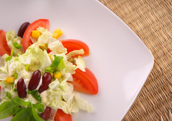 Fresh tomato salad with corn and basil