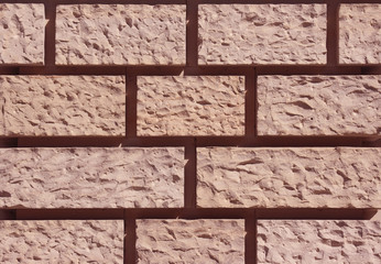 Brick background from wall with spaces between briskc