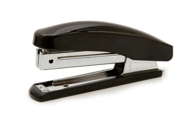 black stapler on white background