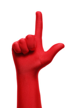 Strange Hand With Red Glove Pointing With A Finger