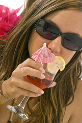 Girl drinking her cocktail