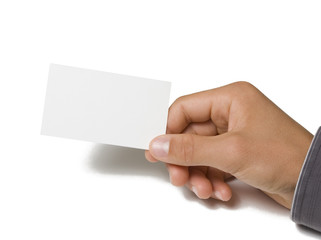 Fototapeta premium Blank business card in hand on white background