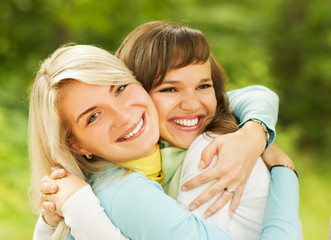 Fototapeta premium Two beautiful young women outdoors