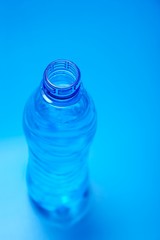 Open bottle of mineral water