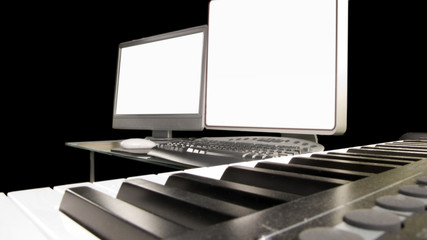 a computer music workstation and keyboard