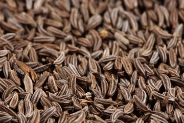 Caraway seeds close-up background texture