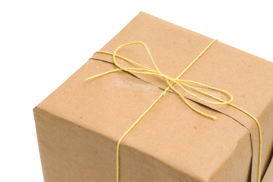 Parcel wrapped in brown paper and tied.