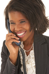 Sexy young adult african businesswoman in a business suit