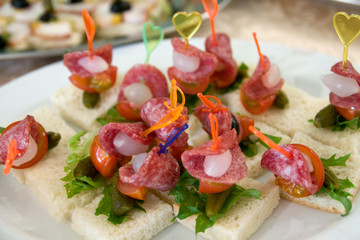 Sausage canapes in restaurant - table arrangement